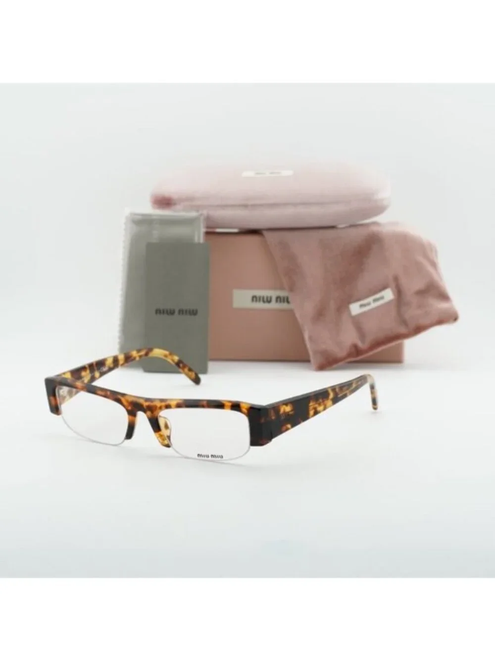 Miu Miu MUB07S 14L08N Sunglasses Havana Rectangle Frame, Blue-Violet Filter